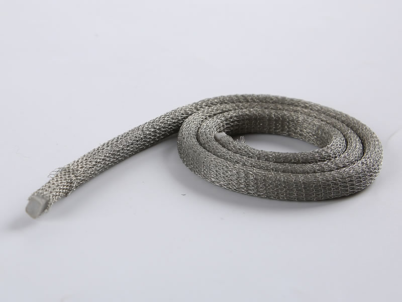 A roll of knitted mesh gasket with elastomer core.