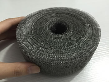 A roll of stainless steel knitted mesh.