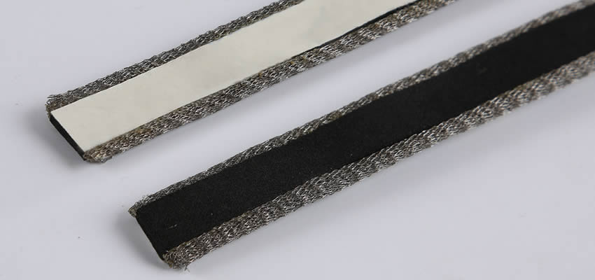 Compressed knitted mesh gasket, with double gaskets on both side and foam in the center with adhesive.