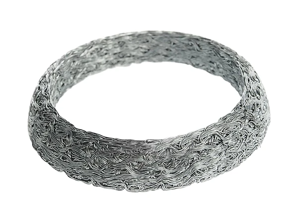 Compressed knitted mesh exhaust seal ring resembling a donut on a white background