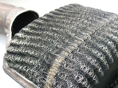 A piece of knitted mesh engine breather is installed on the three way catalyst.