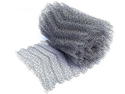 A unpacked stainless steel knitted mesh on the white background.